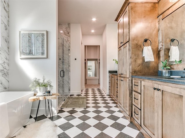 bathroom with plus walk in shower and vanity