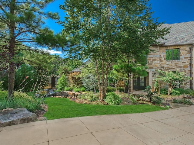 view of yard with french doors