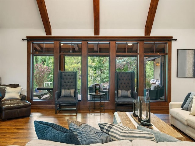 living room with hardwood / wood-style flooring and beamed ceiling