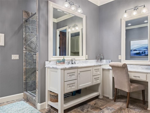 bathroom featuring vanity, a shower with door, and crown molding