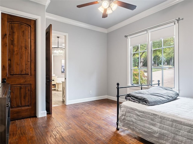 bedroom featuring dark hardwood / wood-style floors, ensuite bath, ceiling fan, and ornamental molding