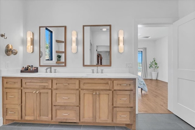 bathroom featuring vanity and tile patterned floors