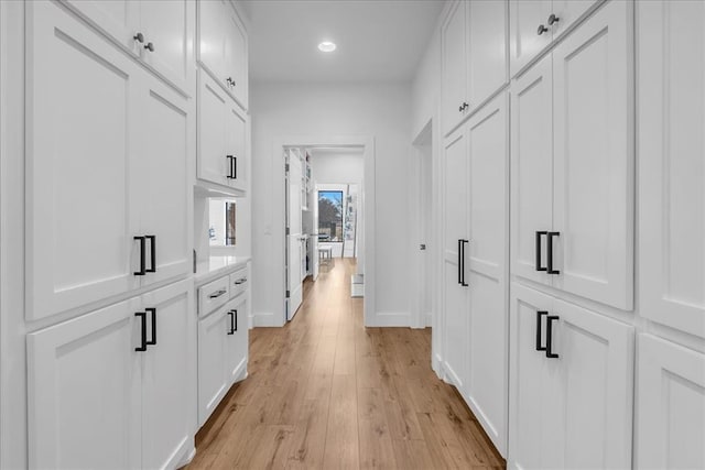 hall featuring light hardwood / wood-style flooring