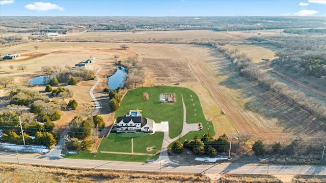 drone / aerial view with a rural view