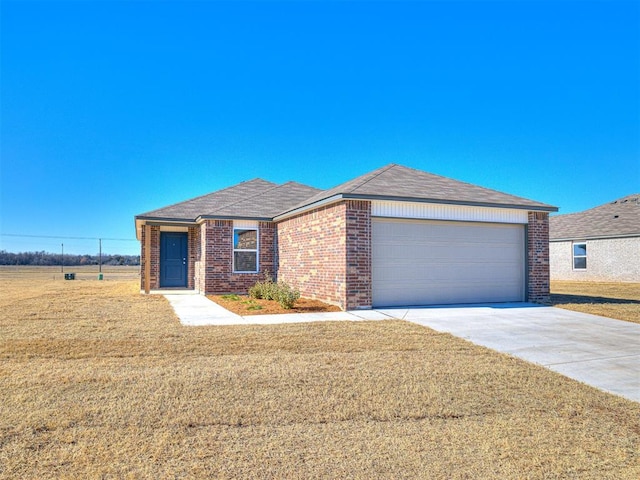 single story home with a garage and a front yard