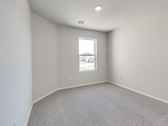 unfurnished room featuring carpet flooring