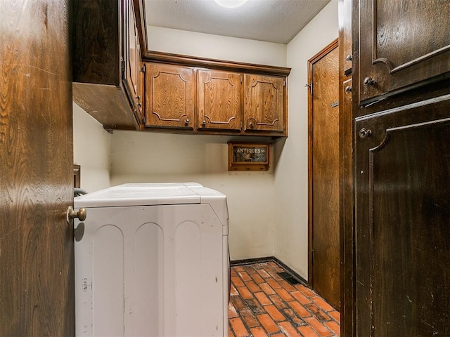 laundry area with cabinets and washer and dryer