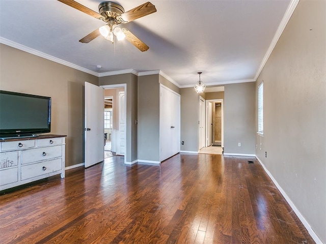 unfurnished living room featuring ceiling fan, ornamental molding, and dark wood-type flooring