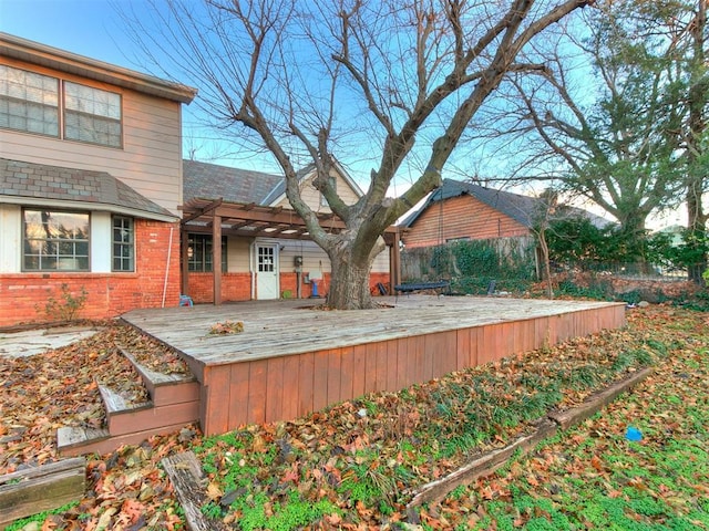 wooden terrace with a pergola