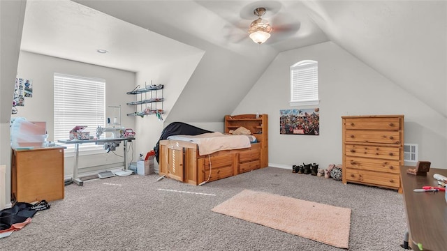 carpeted bedroom featuring ceiling fan and lofted ceiling