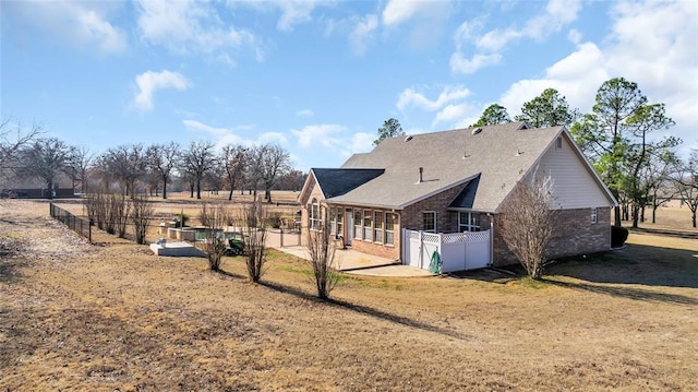 back of property with a patio area