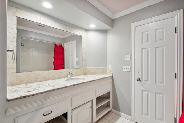 bathroom featuring vanity, tile patterned floors, crown molding, a shower with shower curtain, and decorative backsplash