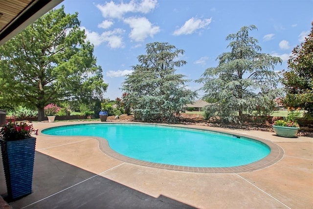 pool with a patio