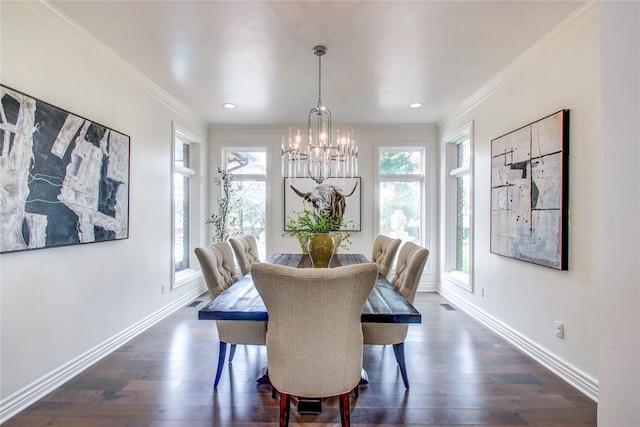 5801 Oak Tree Rd, Edmond, OK 73025 - dining area featuring dark wood-style flooring, a chandelier, recessed lighting, and crown molding