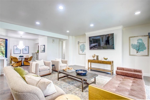 5801 Oak Tree Rd, Edmond, OK 73025 - living area with recessed lighting, wood finished floors, and ornamental molding