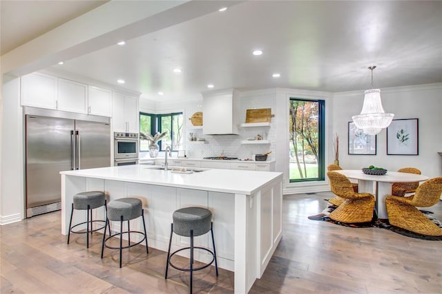 5801 Oak Tree Rd, Edmond, OK 73025 - kitchen with appliances with stainless steel finishes, white cabinets, open shelves, decorative backsplash, and recessed lighting