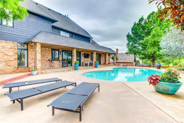 5801 Oak Tree Rd, Edmond, OK 73025 - outdoor pool featuring a patio area