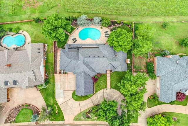 5801 Oak Tree Rd, Edmond, OK 73025 - drone / aerial view of a pool area