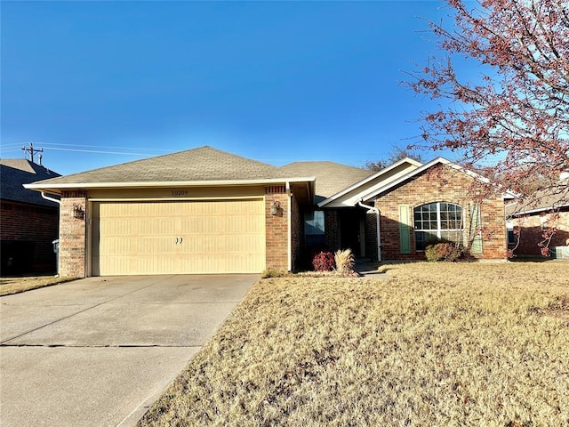 ranch-style home with a garage