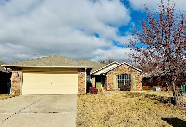 ranch-style home featuring a garage