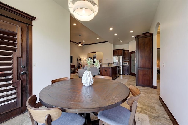 dining space with ceiling fan