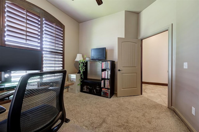 home office featuring ceiling fan and light colored carpet