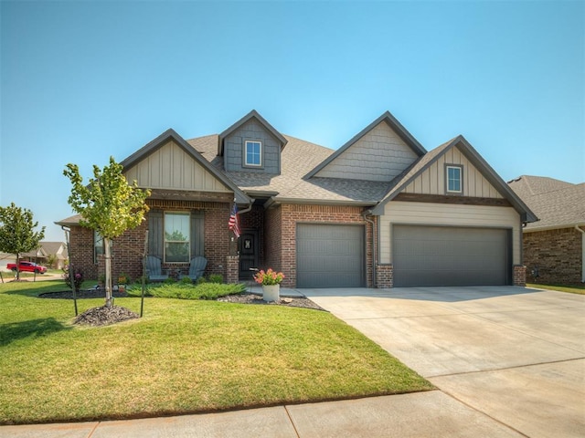 craftsman inspired home featuring a garage and a front yard