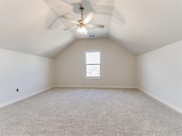 bonus room with carpet, ceiling fan, and vaulted ceiling