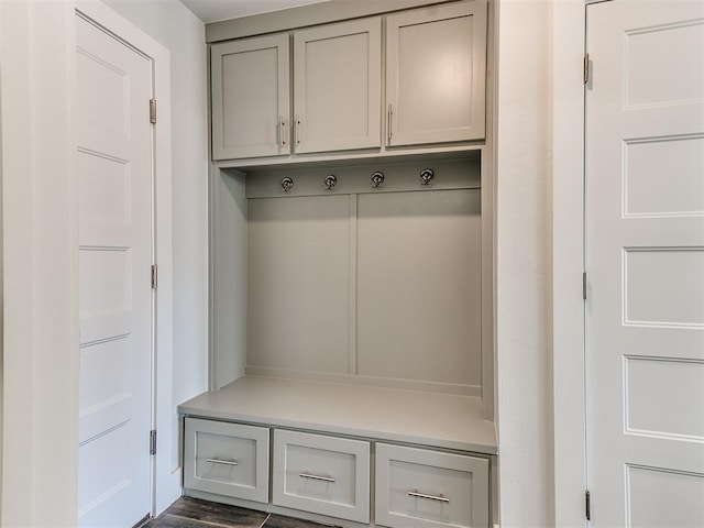 mudroom with dark wood-type flooring