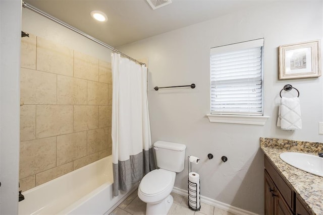 full bathroom with tile patterned flooring, vanity, toilet, and shower / bath combo with shower curtain