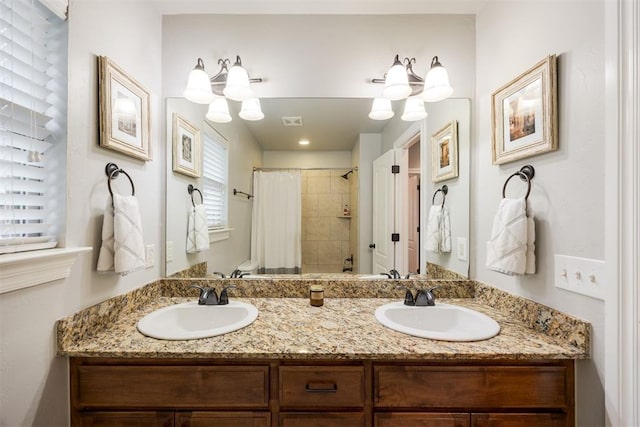 bathroom featuring vanity and shower / bath combo with shower curtain