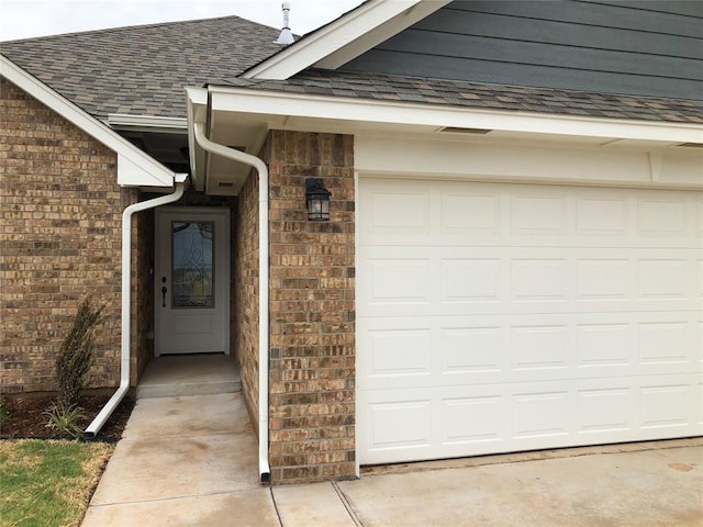 property entrance with a garage