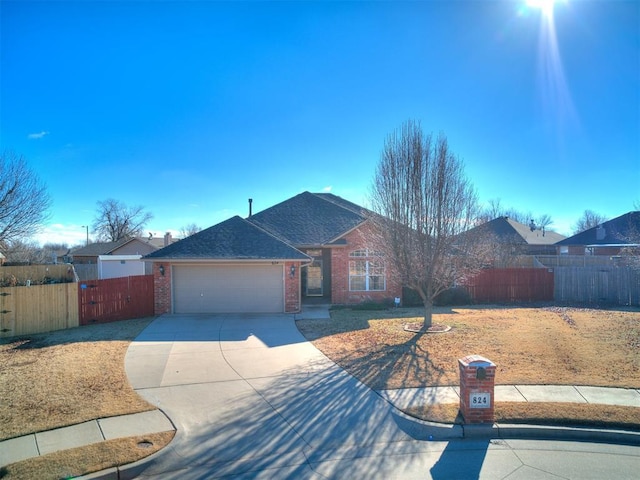 single story home featuring a garage