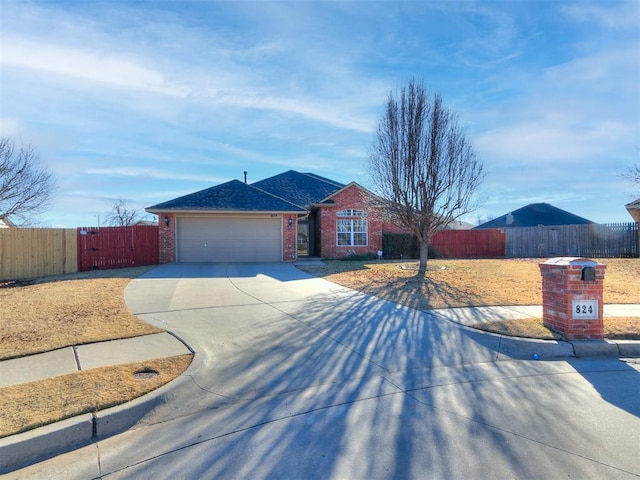 ranch-style home featuring a garage