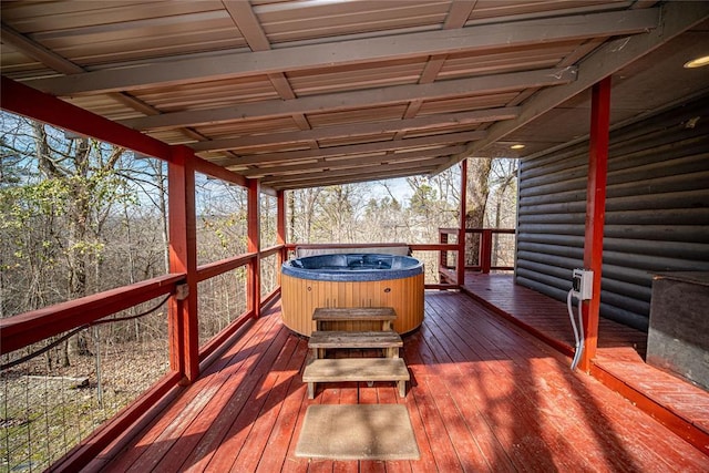 deck with a hot tub