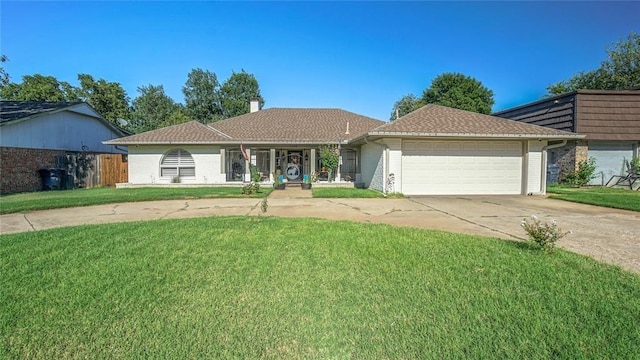 single story home with a garage and a front yard