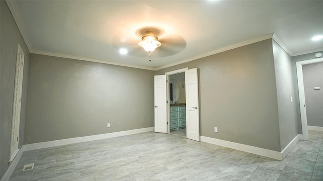 unfurnished bedroom featuring ceiling fan, crown molding, and connected bathroom