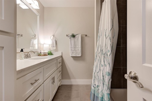 bathroom with shower / bath combination with curtain, vanity, and tile patterned flooring