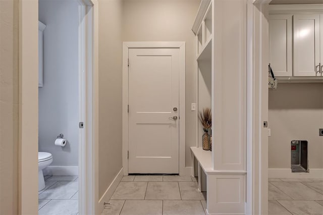 mudroom featuring light tile patterned flooring