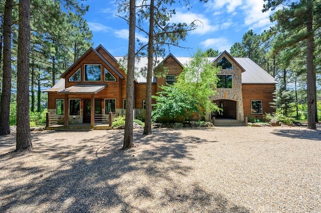 log cabin featuring a porch