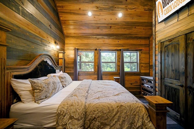 bedroom featuring wood walls, wooden ceiling, and vaulted ceiling