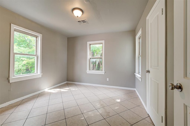 view of tiled spare room