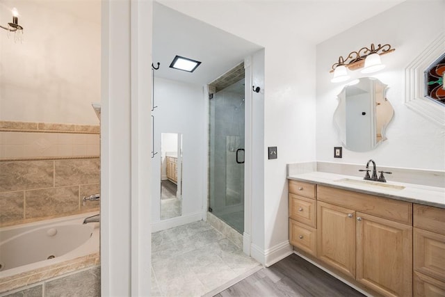 bathroom with vanity and plus walk in shower