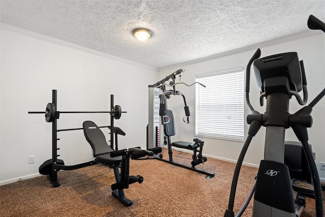 exercise room with carpet floors, a textured ceiling, and ornamental molding