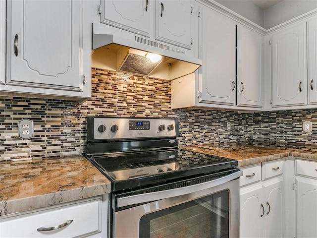 kitchen featuring white cabinetry, backsplash, and electric range