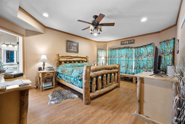 bedroom with ornamental molding, ceiling fan, and light hardwood / wood-style flooring