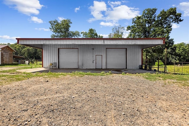 view of outdoor structure with a garage