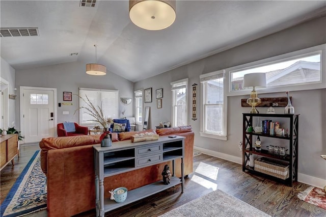 living room with hardwood / wood-style flooring and lofted ceiling