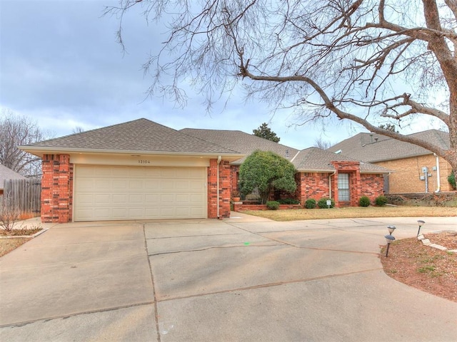 ranch-style house featuring a garage