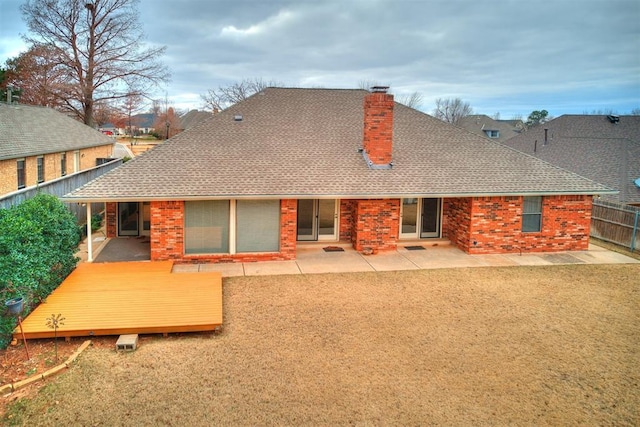 back of property with a patio area